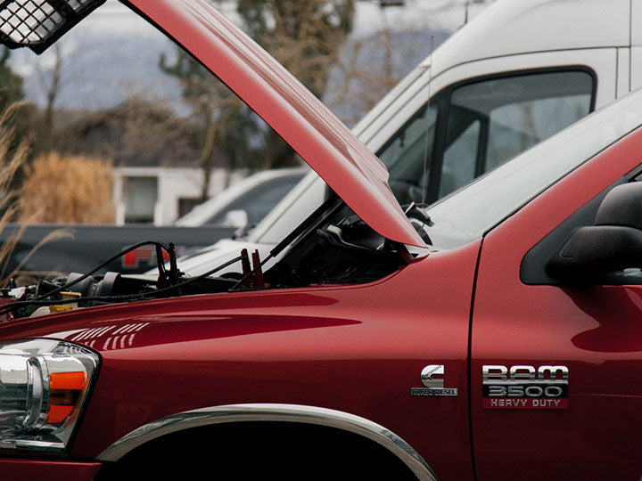 red Ram 3500 performing air conditioner service
