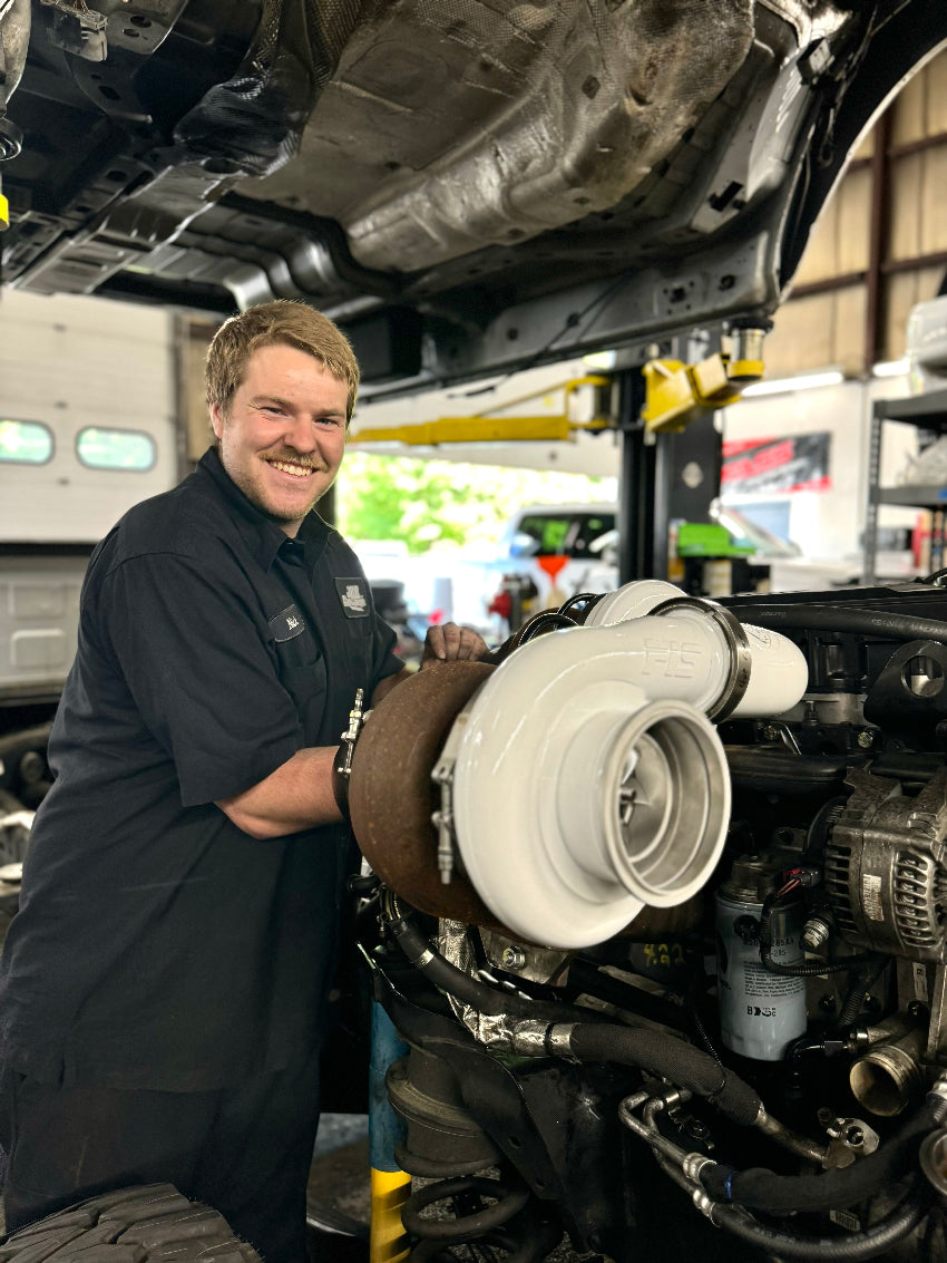 JRB employee working on engine