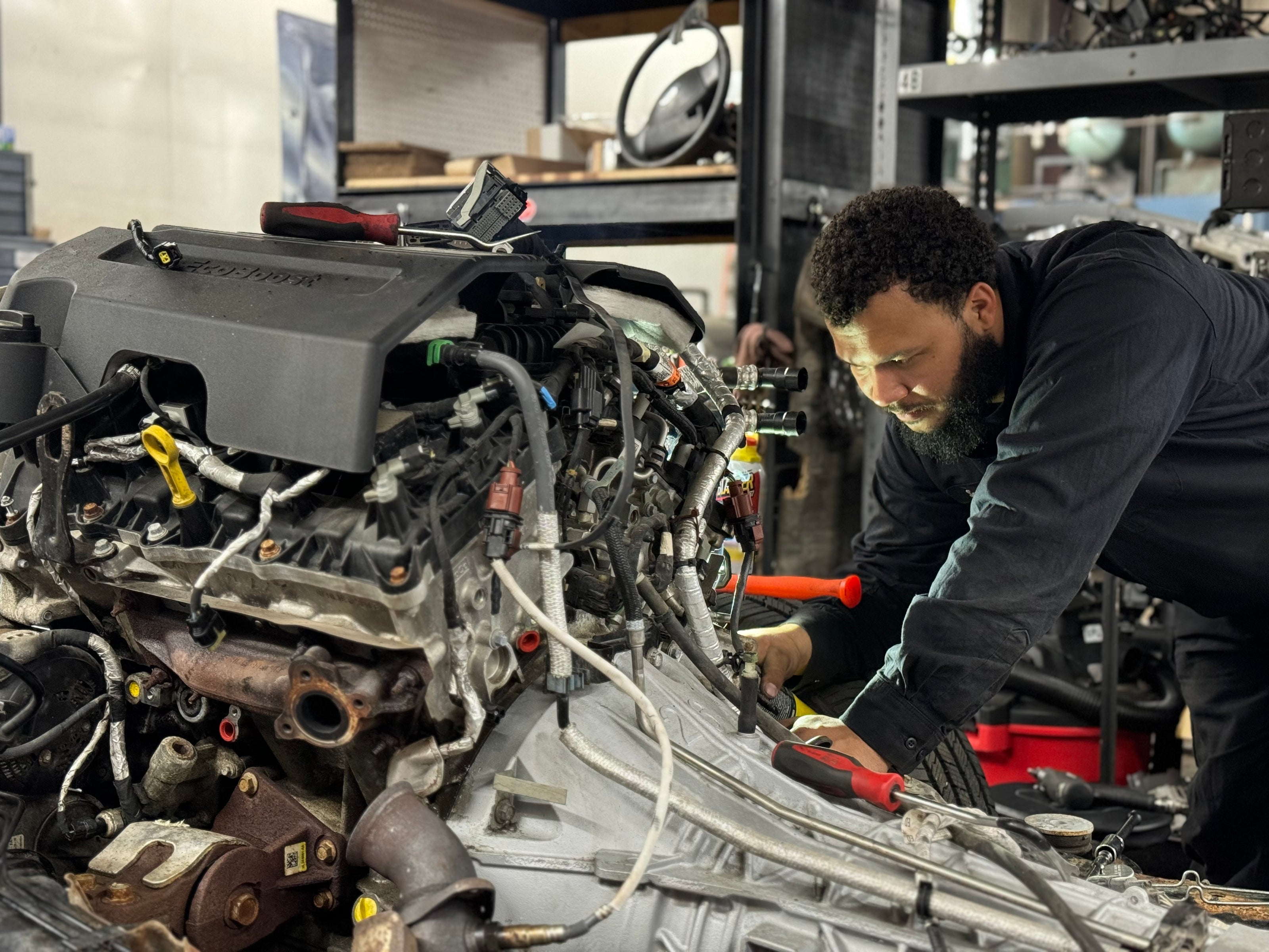 JRB employee working on engine