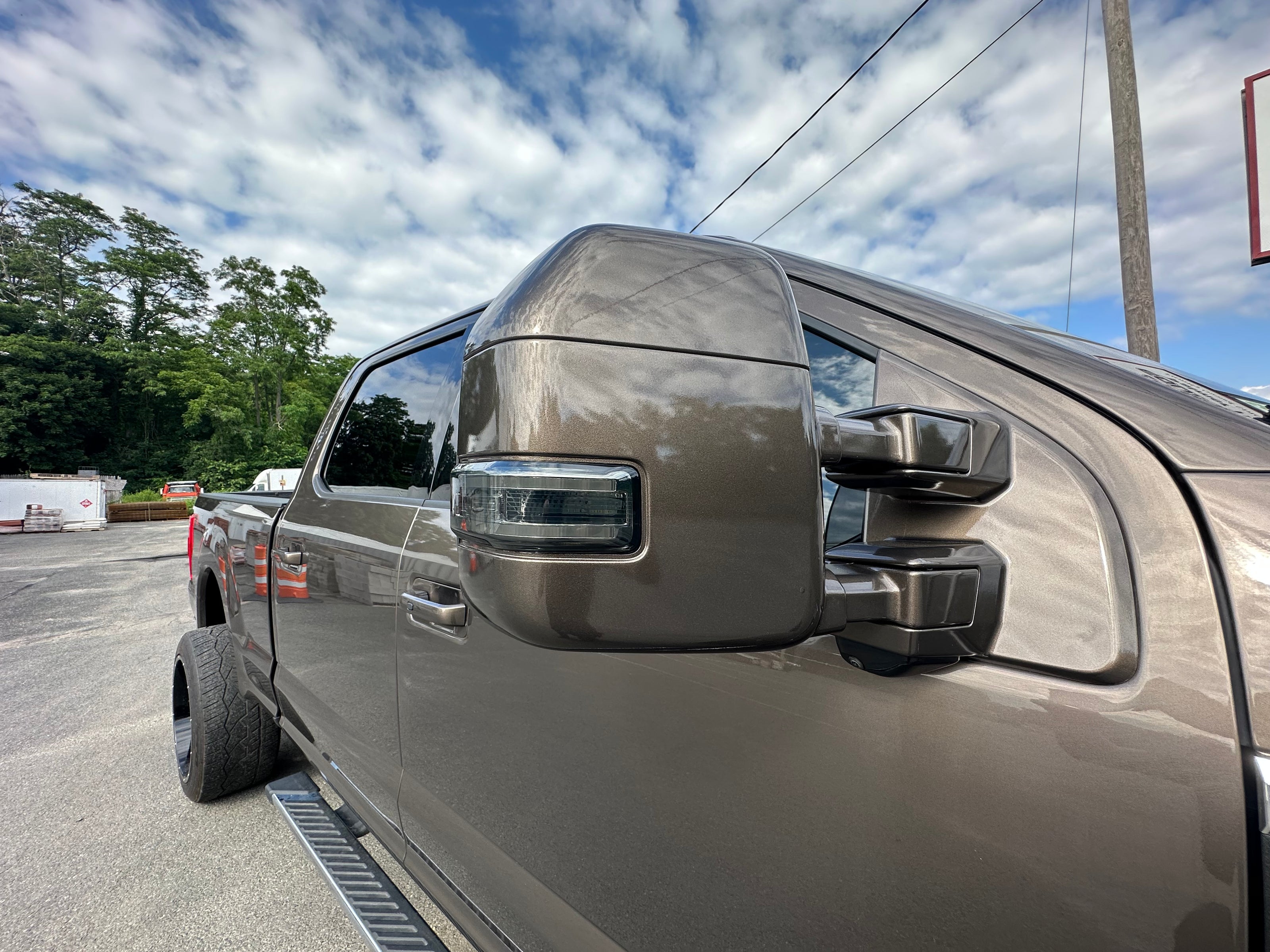 close up front passenger side view mirror