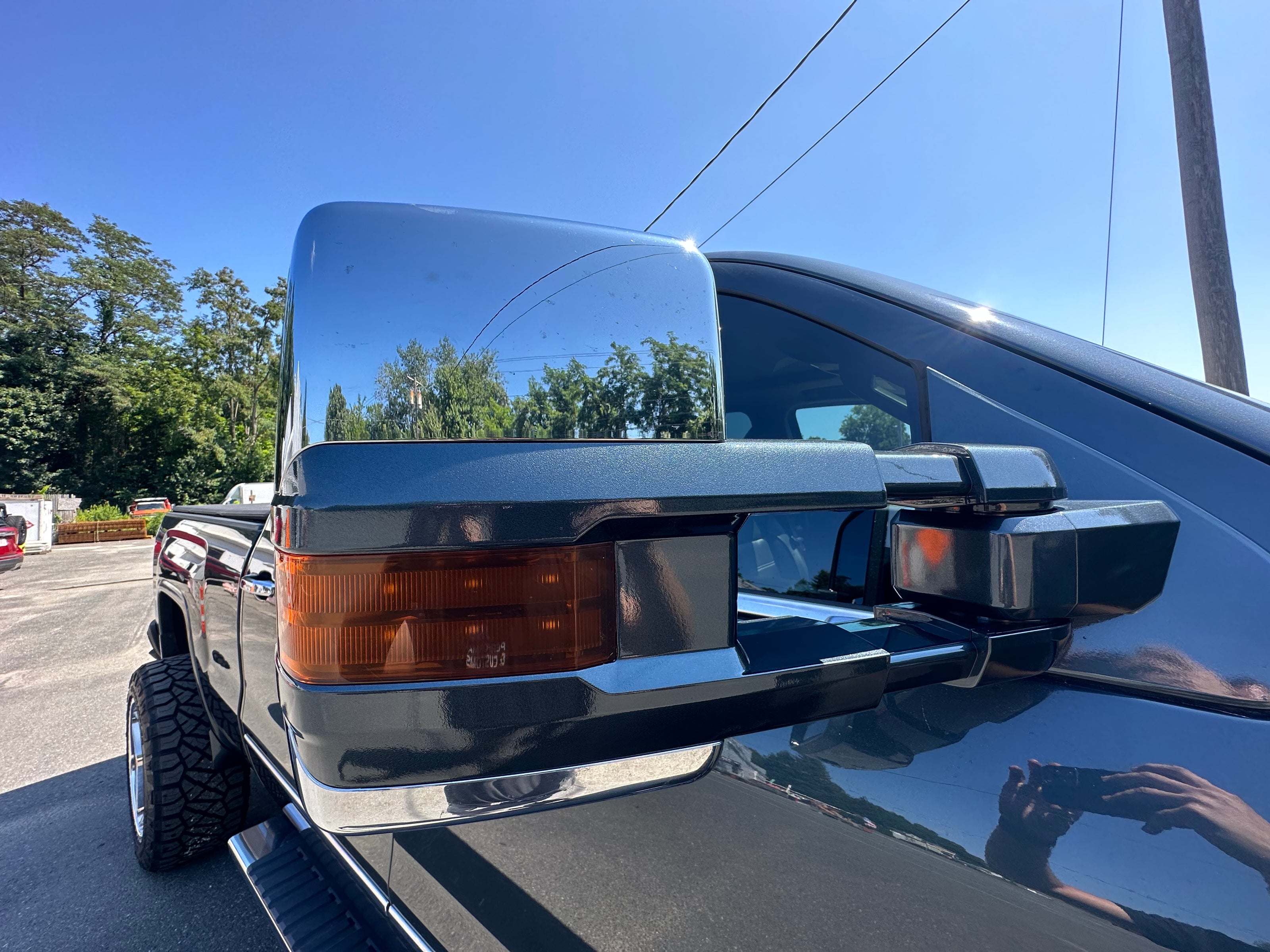 close up front passenger side view mirror